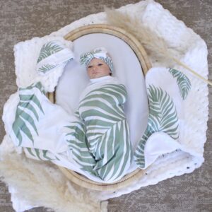 Handcrafted wrap set, perfect for swaddling baby and helps reduce the startle reflex, promoting longer, more restful sleep for your baby in a South African-inspired nursery. Cinnamon and Spice. Featuring Palm Leaf Set Neutral print