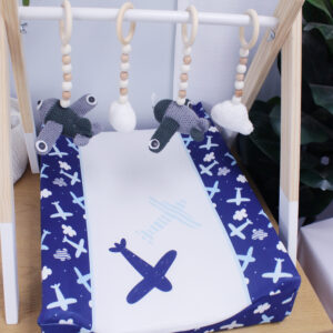Natural wooden baby gym with handcrafted hanging toys – promotes sensory play and motor skills for newborns, by Cinnamon and Spice Baby Boutique.