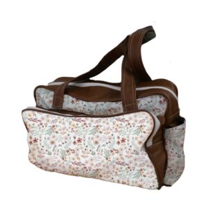A personalised floral diaper bag with leather handles and personalized with name detail, handcrafted for moms in South Africa. Cinnamon and Spice