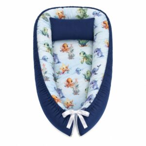 Happy Boy Under The Sea Blue baby nest with padded raised sides and a small matching head pillow, designed to create a cozy, secure sleeping space for infants.