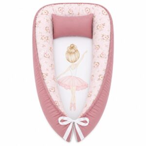 Flower and Ballerinas all Blonde baby nest with padded raised sides and a small matching head pillow, designed to create a cozy, secure sleeping space for infants.