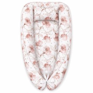 Full Floral Pink and Grey baby nest with padded raised sides and a small matching head pillow, designed to create a cozy, secure sleeping space for infants.