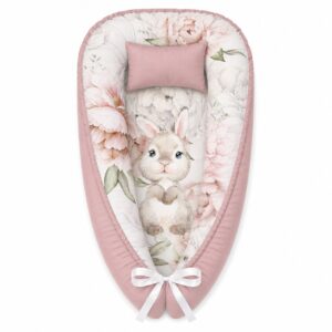 Pop Of Peoni Bunny baby nest with padded raised sides and a small matching head pillow, designed to create a cozy, secure sleeping space for infants.