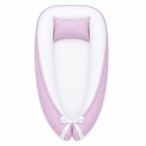 Light Purple baby nest with padded raised sides and a small matching head pillow, designed to create a cozy, secure sleeping space for infants.