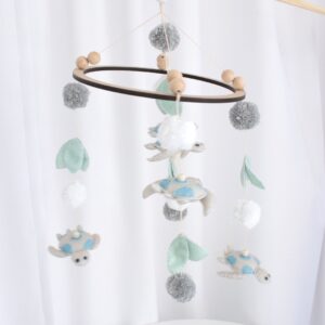 Turtle and Leaf themed cot mobile with handcrafted characters, perfect for adding classic charm to your baby’s nursery – Cinnamon and Spice Baby Boutique.