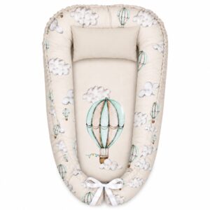 Air Balloon Sage Green and Beige baby nest with padded raised sides and a small matching head pillow, designed to create a cozy, secure sleeping space for infants.