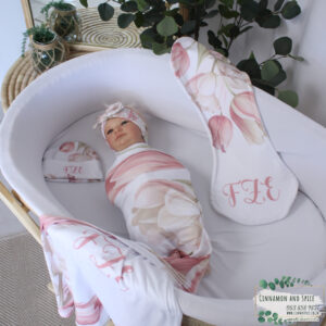 Handcrafted wrap set, perfect for swaddling baby and helps reduce the startle reflex, promoting longer, more restful sleep for your baby in a South African-inspired nursery. Cinnamon and Spice. Featuring Tulips print