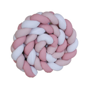Braided cot crib bumper in soft pastel pink tones, handcrafted for nursery safety and style – customisable by Cinnamon and Spice Baby Boutique.
