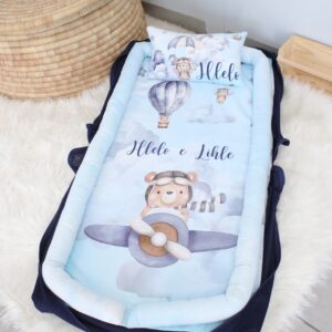 Printed baby nest / baby pod with matching pillow in Blue Bear Planes And Air Balloons Light Blue tones, offering a cozy, secure space for newborns – part of a handcrafted South African nursery set. Cinnamon and Spice