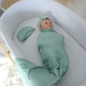 Handcrafted wrap set, perfect for swaddling baby and helps reduce the startle reflex, promoting longer, more restful sleep for your baby in a South African-inspired nursery. Cinnamon and Spice. Featuring Sage Green print