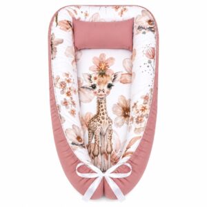 Wildflower Rusty Safari Pot baby nest with padded raised sides and a small matching head pillow, designed to create a cozy, secure sleeping space for infants.