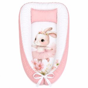 Wildflower Twirling Bunny baby nest with padded raised sides and a small matching head pillow, designed to create a cozy, secure sleeping space for infants.
