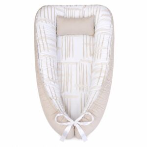 Small Kudu Earthy Print baby nest with padded raised sides and a small matching head pillow, designed to create a cozy, secure sleeping space for infants.