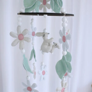 Cot mobile with daisies, bunnies and leaves - handcrafted for a calming and stylish baby nursery – Cinnamon and Spice Baby Boutique.