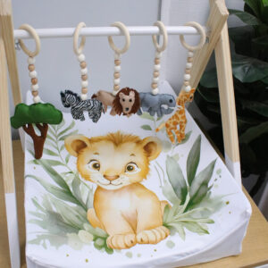 Natural wooden baby gym with minimalist wooden dangles hanging from frame. Brand: Cinnamon and Spice