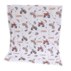 Handcrafted custom fleece blanket, personalized with a name on, featuring a dirt bike, featuring personalized printed and premium hypo-allergenic baby safe fabric, designed for elegant boho nursery décor. Cinnamon and Spice
