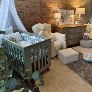 Compactum & Cot Combo – Natural Oak & Coloured Compactum with Neptune Baby Cot | CC Range | Cinnamon & Spice South Africa Matching sage green and natural oak baby cot and compactum set with clean lines and brass hardware, styled in a modern South African nursery with cozy textures, neutral tones, and handcrafted decor—designed for beauty, comfort, and everyday functionality.