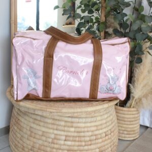 Personalised floral duffel bag with tan leather straps, perfect for baby travel or weekend getaways. Personalization is free. Cinnamon and Spice