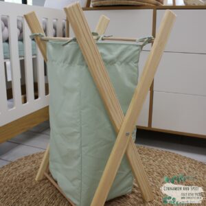 Handcrafted baby laundry basket with wooden frame featuring Sage Green print – washable and foldable by Cinnamon and Spice