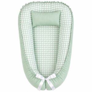 Small Check Gingham Print Sage Green baby nest with padded raised sides and a small matching head pillow, designed to create a cozy, secure sleeping space for infants.