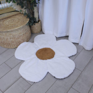 Fluffy daisy-shaped baby playmat with soft white petals and customisable centre, ideal for nurseries or toddler room décor.