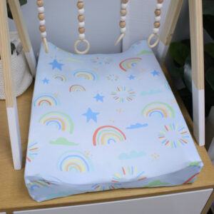 Neutral-toned changing mat cover with sage rainbow and sun motif—soft stretchy fabric for stylish and comfy diaper changes.