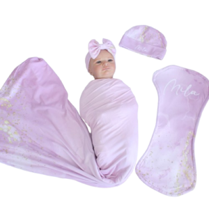 Handcrafted wrap set, perfect for swaddling baby and helps reduce the startle reflex, promoting longer, more restful sleep for your baby in a South African-inspired nursery. Cinnamon and Spice. Featuring Purple Marble with Gold print