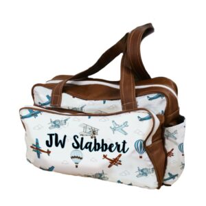 A personalised floral diaper bag with leather handles and personalized with name detail, handcrafted for moms in South Africa. Cinnamon and Spice