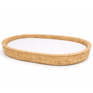 a Woven Changing Basket with Mattress and Protector and White Fitted Sheet