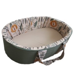 Carry cot with a cute lion cub safari print, handcrafted for newborn comfort and portability – Cinnamon and Spice Baby Boutique.