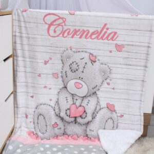 Soft blush floral fleece blanket with customized designs, perfect for baby snuggles and nursery coziness