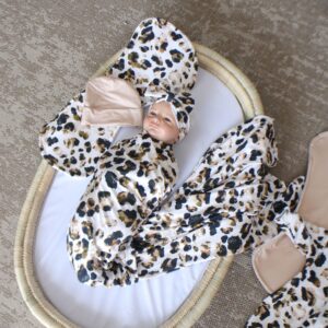Handcrafted wrap set, perfect for swaddling baby and helps reduce the startle reflex, promoting longer, more restful sleep for your baby in a South African-inspired nursery. Cinnamon and Spice. Featuring Large Leopard Print