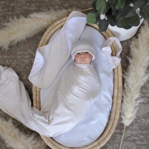 Handcrafted wrap set, perfect for swaddling baby and helps reduce the startle reflex, promoting longer, more restful sleep for your baby in a South African-inspired nursery. Cinnamon and Spice. Featuring Beige print