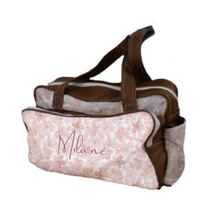 A personalised floral diaper bag with leather handles and personalized with name detail, handcrafted for moms in South Africa. Cinnamon and Spice