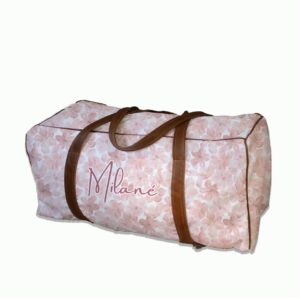 Personalised floral duffel bag with tan leather straps, perfect for baby travel or weekend getaways. Personalization is free. Cinnamon and Spice