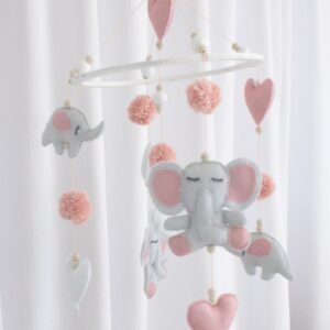 pink ellie heart and pom pom themed cot mobile with handcrafted characters, perfect for adding classic charm to your baby’s nursery – Cinnamon and Spice Baby Boutique.