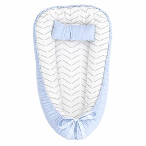Light Blue Herringbone baby nest with padded raised sides and a small matching head pillow, designed to create a cozy, secure sleeping space for infants.