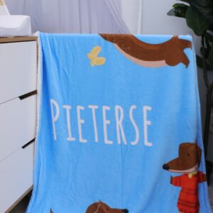 Soft blush floral fleece blanket with customized designs, perfect for baby snuggles and nursery coziness