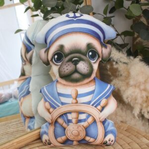 Who Let The Pugs Out At Sea shaped pillow with gentle padding—cute and comforting nursery accent.