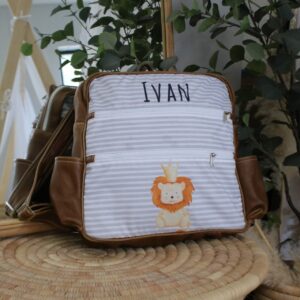 A personalised floral diaper bag with leather handles and personalized with name detail, handcrafted for moms in South Africa. Cinnamon and Spice