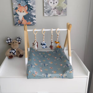 Woodlands Scattered Green | Baby Changing Mat Cover | Cinnamon & Spice South Africa Neutral-woodlands themed changing mat cover and baby gym with green motif—soft stretchy fabric for stylish and comfy diaper changes.