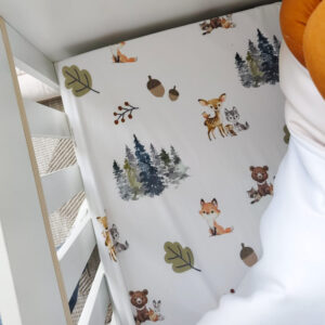 Woodlands Scattered Green | Fitted Sheet | Cinnamon & Spice South Africa Soft, breathable baby cot fitted sheets in various designs and sizes, ensuring a snug fit for your crib mattresses. Custom made for you by Cinnamon and Spice