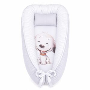 Happy Snoopy Boy baby nest with padded raised sides and a small matching head pillow, designed to create a cozy, secure sleeping space for infants.