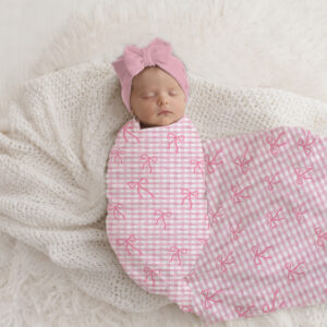 Pink Bow Checkered Gingham Bow Swaddle Wrap Set | Newborn Hospital Set | Cinnamon & Spice South Africa Handcrafted wrap set, perfect for swaddling baby and helps reduce the startle reflex, promoting longer, more restful sleep for your baby in a South African-inspired nursery. Cinnamon and Spice. Featuring any print