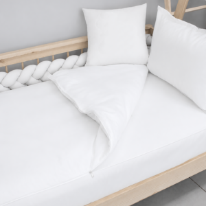 Zipper Bedding | Custom Design / Colors | Cinnamon and Spice | Cinnamon & Spice South Africa White or custom themed zipper bedding set for toddlers, custom made from ultra-soft, hypoallergenic material, shown neatly zipped on a toddler bed.